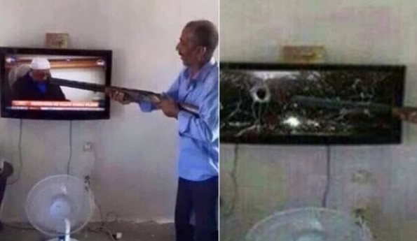 Gülen'i görünce televizyona ateş etti