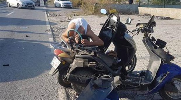 Sürücüsü yaralanan motosikletin deposuna hortum sokup benzin çekti