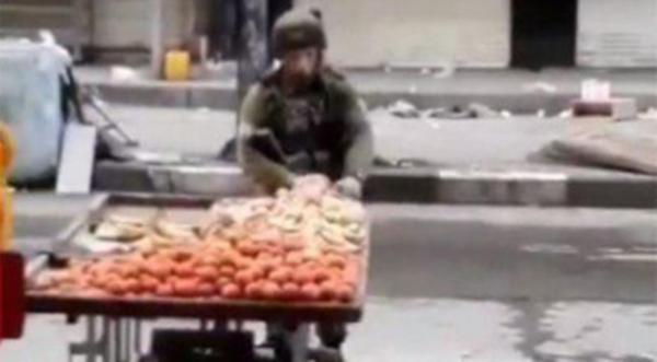 Filistinli satıcının elmalarını çalan İsrailli komutan açığa alındı