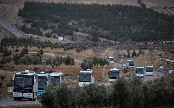 Türkiye'deki ÖSO militanları otobüslerle sınırı geçti!